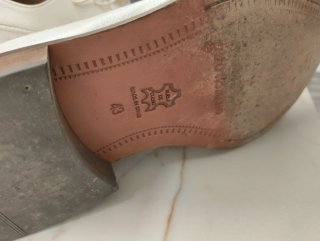 Mocasines blancos roto de piel