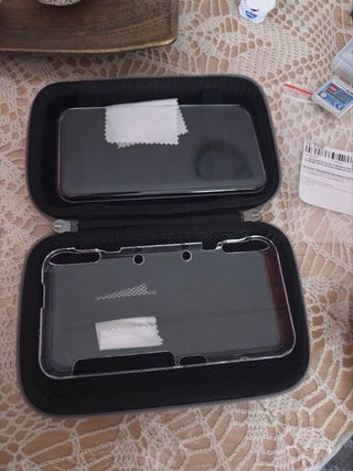 Nintendo New 2DS XL Naranja y Blanca + Accesorios