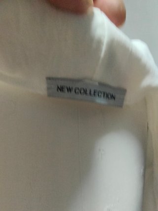 Cardigan lungo smanicato New Collection