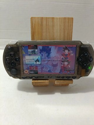 PSP Sony Negra con funda Logitech