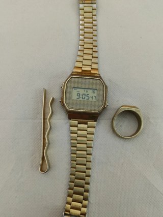 Lote Reloj, Anillo sello y Pisa corbata.
