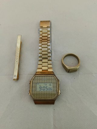 Lote Reloj, Anillo sello y Pisa corbata.