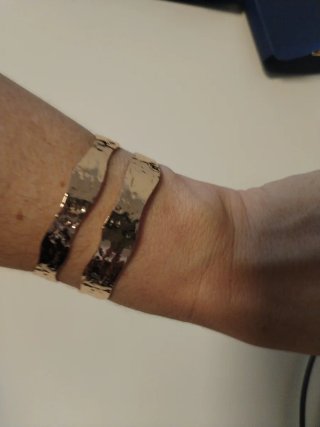 Pulsera esclava Stradivarius dorada