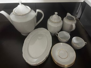 Juego de vajilla porcelana baño oro