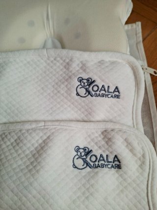 Almohada bebé Koala Babycare con 2 fundas.