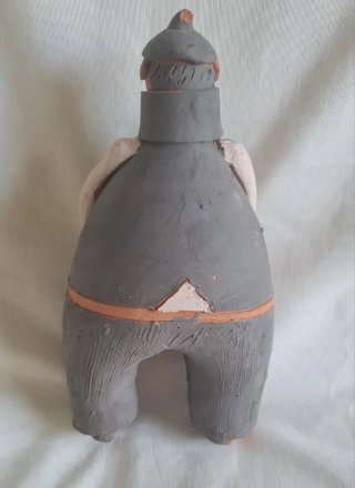 Figura rústica de barro hombre