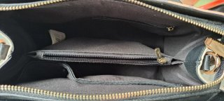 Bolso de mano.