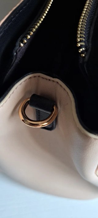 Bolso de mano.