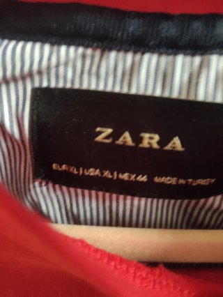 Sudadera roja con estampado de velero