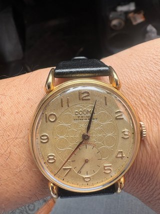 Reloj Dogma Prima de cuerda dorado