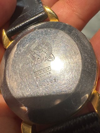 Reloj Dogma Prima de cuerda dorado