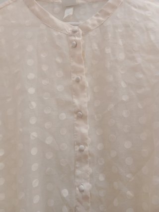 Vestido blanco de lunares transparente