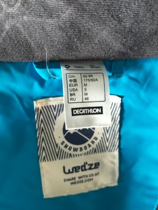 Chaqueta de nieve azul y marrón