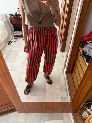 Pantalón lino rayas marrón y coral