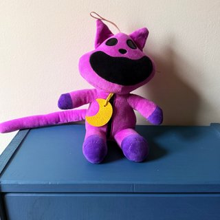 Peluche gato morado con luna