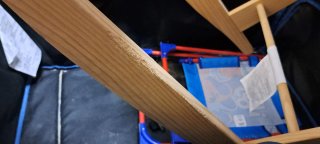Moisés de mimbre con soporte de madera