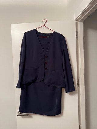 Vestido azul sin mangas, con chaqueta a juego
