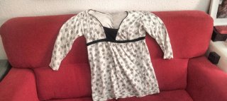 Camiseta negra con bolsillo lentejuelas Talla L