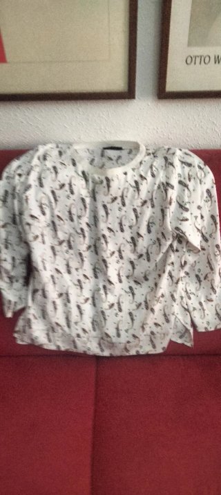 Camiseta negra con bolsillo lentejuelas Talla L