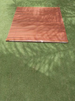 Persiana de madera graduable