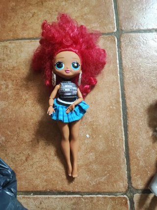 Lote de muñecas y ropa