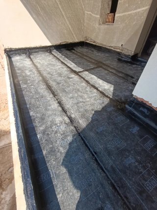 Oficial de tela asfáltica.
