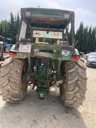 Tractor John Deere 2450 con pala