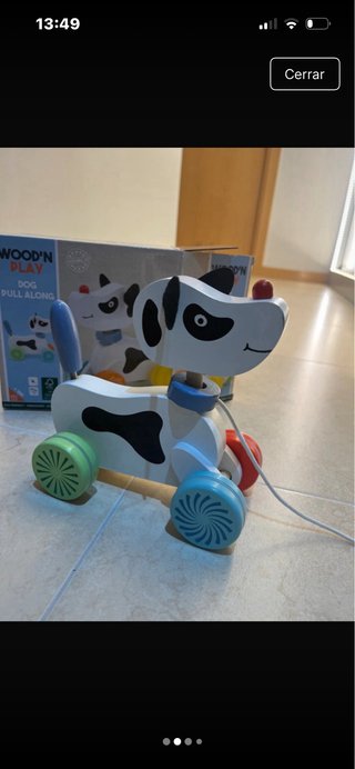 Perro de madera para tirar de la cuerda