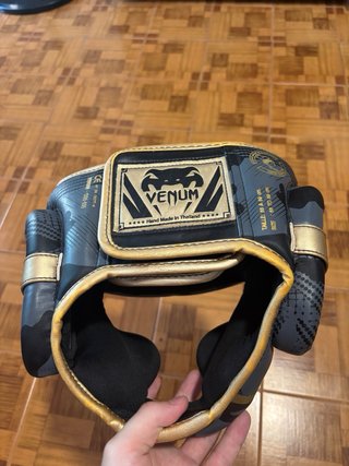 Espinilleras Venum Elite Evo Negras/Naranja