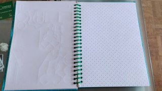 Quaderno con 40 adesivi di robot