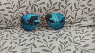 Gafas de sol aviador azules y doradas