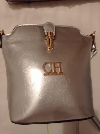 Bolso plateado sin usar