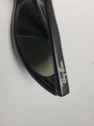 Gafas de sol Ray-Ban negras y marrones