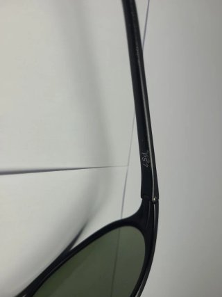 Gafas de sol Ray-Ban negras y marrones