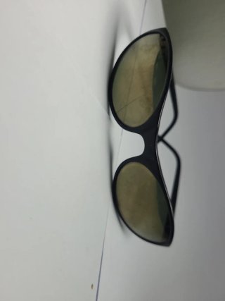Gafas de sol Ray-Ban negras y marrones