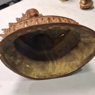 Buda de bronce con aureola