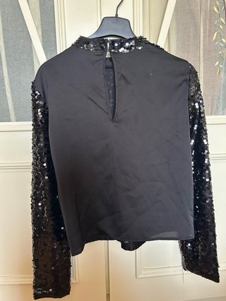 Blusa lentejuelas negra y plateada