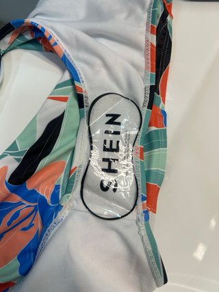 Bikini estampado hojas verde y naranja