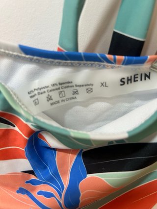 Bikini estampado hojas verde y naranja