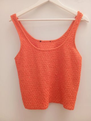 Rebeca y jersey naranja