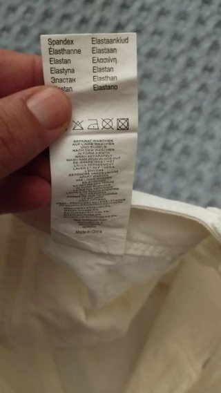 Pantaloni Madonna bianchi strappati