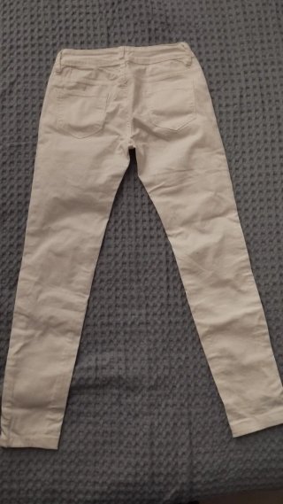 Pantaloni Madonna bianchi strappati