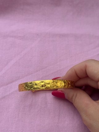 Bracciale placcato in oro con disegno