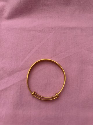 Bracciale placcato in oro con disegno