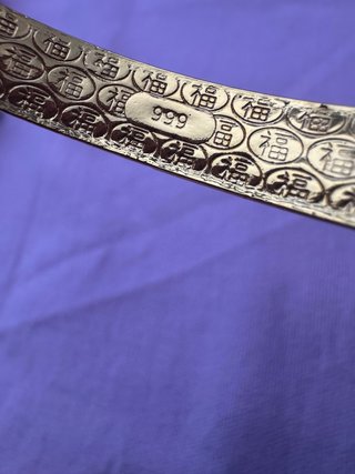 Bracciale placcato in oro con disegno