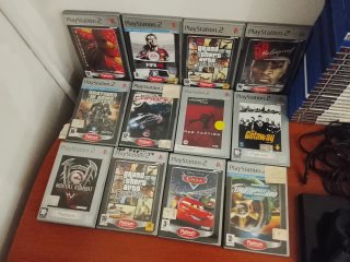 PlayStation 2 Slim + 54 giochi  (Molti Platinum!)