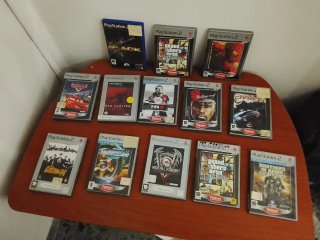 PlayStation 2 Slim + 54 giochi  (Molti Platinum!)