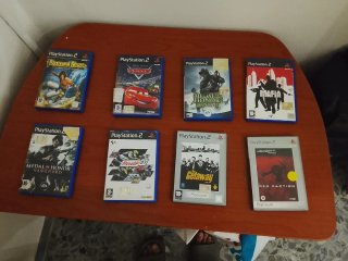 PlayStation 2 Slim + 54 giochi  (Molti Platinum!)