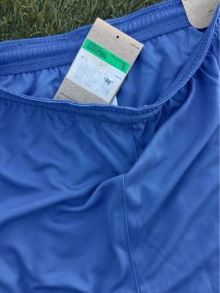 Pantalón niño Nike azul con etiquetas