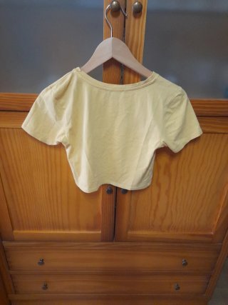 Camiseta amarilla Primark talla M.